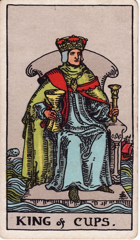 カップのキング（King of Cups）のカード画像。ライダー版タロット